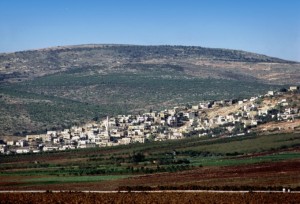 Daberath, a city in the tribal territories of Issachar and Naphtali near Mount Tabor (background); probably the site of the defeat of the Canaanite king Jabin's army under Sisera (Judges 4). Barak gathered an army here to fight Sisera, and it is one traditional site of the Transfiguration.